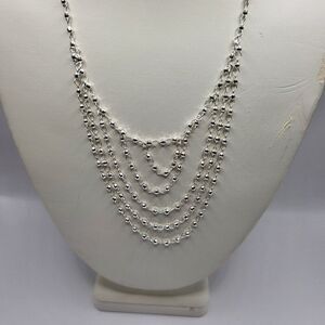 Sevilla sterling silver necklace, beautiful in person.  Mirror effect.